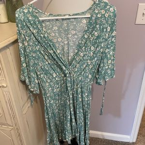 Green flutter sleeve dress